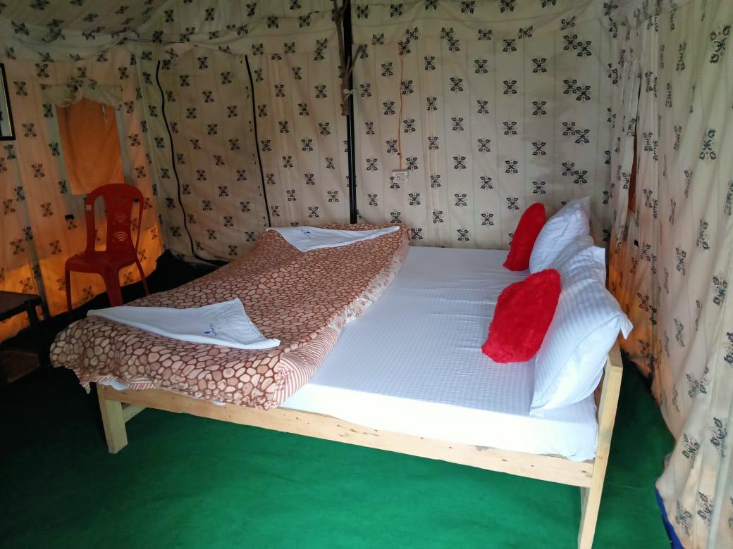 Blue Poppy Swiss Cottage camps