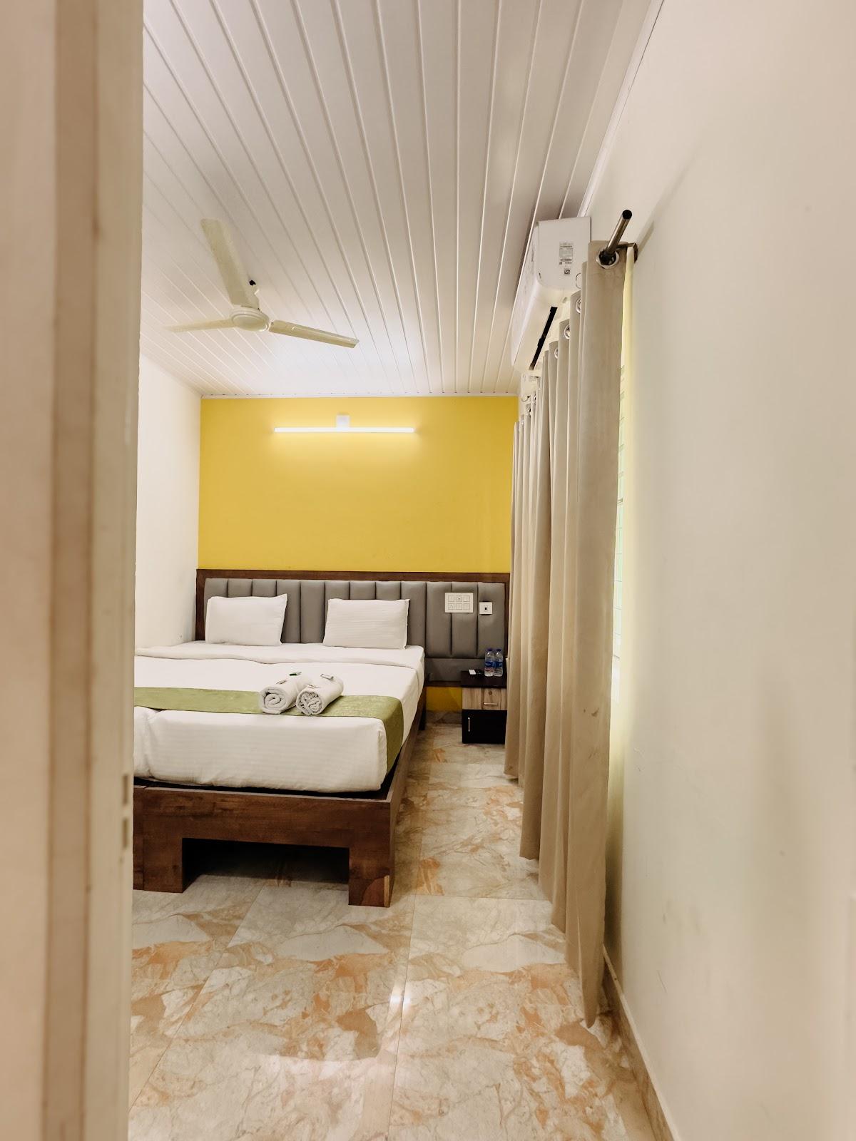 Heraa Inn Deralakatte - AC & non AC Family Room – photo 3