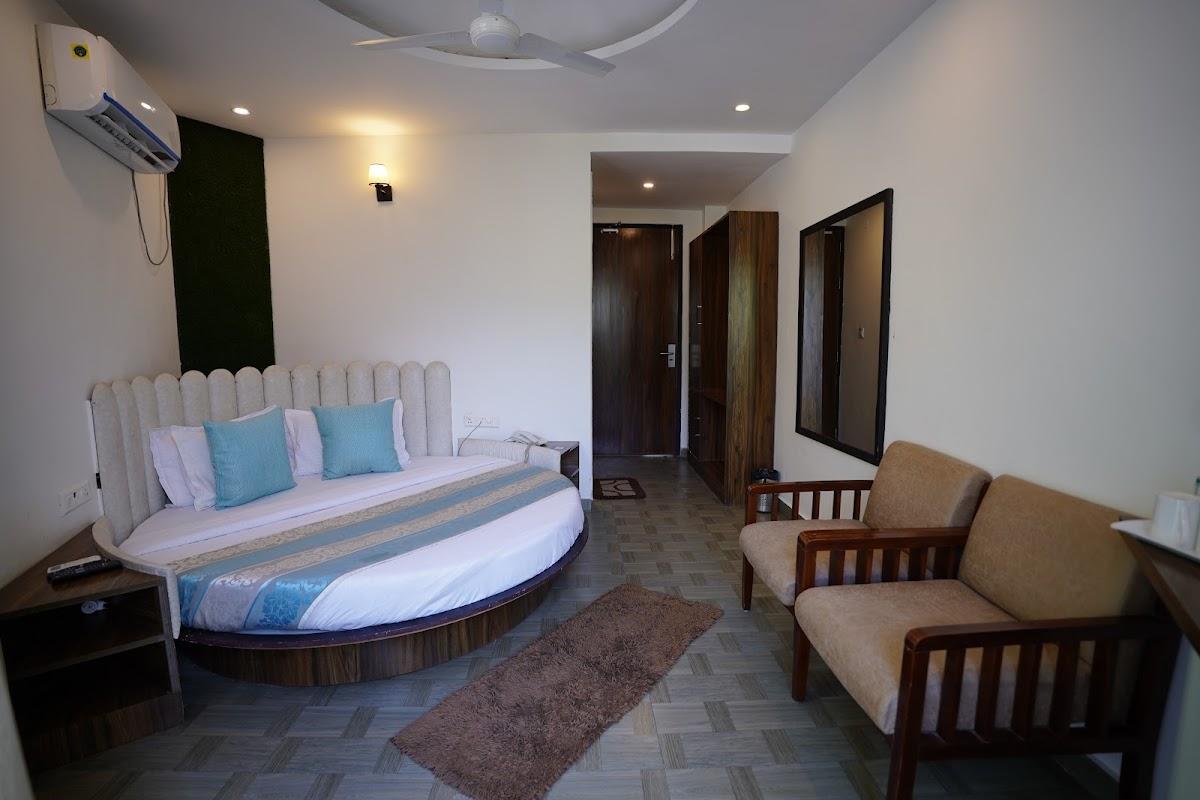 Aroha Residency Inn White flower – photo 1